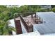 Aerial view of a rooftop deck with multiple chairs at 421 Pine Ave, Anna Maria, FL 34216