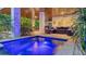 Illuminated spa with seating area on patio at 421 Pine Ave, Anna Maria, FL 34216