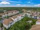 Aerial view of condo building and surrounding area at 4215 Breezeway Blvd # 2420, Sarasota, FL 34238