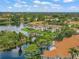 Aerial view of community by the lake at 4215 Breezeway Blvd # 2420, Sarasota, FL 34238