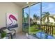 Bright balcony with seating and a view of the community at 4215 Breezeway Blvd # 2420, Sarasota, FL 34238