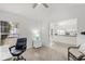 Home office features a view into the kitchen at 4215 Breezeway Blvd # 2420, Sarasota, FL 34238