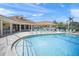 Inviting resort-style pool with lounge chairs at 4215 Breezeway Blvd # 2420, Sarasota, FL 34238