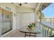 Screened balcony with patio furniture and water views at 4302 Madeira Ct # 3334, Sarasota, FL 34233