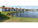 Community waterfront property with lush landscaping and lake views at 4302 Madeira Ct # 3334, Sarasota, FL 34233