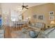 Open living room with vaulted ceiling and neutral decor at 4302 Madeira Ct # 3334, Sarasota, FL 34233