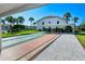 Two shuffleboard courts with covered seating area at 4302 Madeira Ct # 3334, Sarasota, FL 34233