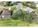 Aerial view of homes with pools and lush landscaping at 4364 Brandywine Dr, Sarasota, FL 34241