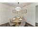 Modern dining area featuring a round wooden table at 4364 Brandywine Dr, Sarasota, FL 34241