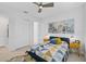 Bright bedroom with geometric bedding, and built-in closet at 4940 Surfside Cir, Bradenton, FL 34211