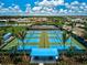 Expansive pickleball and tennis courts with shade structures at 4940 Surfside Cir, Bradenton, FL 34211