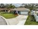 Aerial view showcasing the home's curb appeal and neighborhood setting at 5424 81St Avenue E Cir, Palmetto, FL 34221