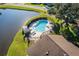 Community pool with lounge chairs at 5424 81St Avenue E Cir, Palmetto, FL 34221