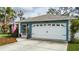 House exterior showcasing the front entrance and garage at 5424 81St Avenue E Cir, Palmetto, FL 34221