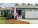 Front entrance of the house, showcasing the porch and landscaping at 5424 81St Avenue E Cir, Palmetto, FL 34221