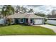 Charming one-story home with a two-car garage and landscaped yard at 5424 81St Avenue E Cir, Palmetto, FL 34221