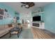 Living room with fireplace and view to dining area at 5424 81St Avenue E Cir, Palmetto, FL 34221