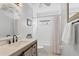 Bright bathroom featuring a modern vanity, white subway tile, and a shower-tub combination at 5827 Beaurivage Ave, Sarasota, FL 34243