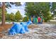 Fun animal figures and playground equipment make the play area at Longwood Park a great place for children at 5827 Beaurivage Ave, Sarasota, FL 34243