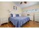 Spacious bedroom with a king-size bed and updated flooring at 6084 Red Maple Rd, Bradenton, FL 34210