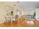 Living room with hardwood floors and comfortable seating at 6084 Red Maple Rd, Bradenton, FL 34210