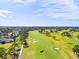 Golf course community with water views and lush landscaping at 617 Whitfield Ave, Sarasota, FL 34243