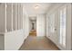 Bright entryway with neutral carpet and double doors at 617 Whitfield Ave, Sarasota, FL 34243