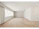 Bright living room with ample natural light and neutral walls at 617 Whitfield Ave, Sarasota, FL 34243