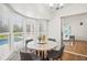 Bright breakfast nook with marble table and pool view at 6228 Fordham Pl, Bradenton, FL 34207