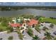 Community clubhouse with pool and lake views at 6428 Devesta Loop, Palmetto, FL 34221