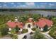 Community clubhouse with pool and lake views at 6428 Devesta Loop, Palmetto, FL 34221