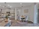 Kitchen breakfast nook with a round table and four chairs at 6428 Devesta Loop, Palmetto, FL 34221