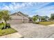 Two-story house with two-car garage and landscaped yard at 6428 Devesta Loop, Palmetto, FL 34221