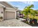 Front view of house, showing garage and walkway at 6428 Devesta Loop, Palmetto, FL 34221