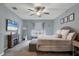 Spacious main bedroom with king-size bed and fireplace at 6428 Devesta Loop, Palmetto, FL 34221