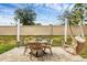 Outdoor patio with table and chairs, perfect for relaxing or dining al fresco at 6428 Devesta Loop, Palmetto, FL 34221