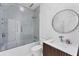 Clean bathroom with marble shower and vanity at 6669 Windjammer Pl, Lakewood Ranch, FL 34202