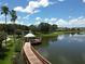 Community boardwalk with gazebo and lake views at 6669 Windjammer Pl, Lakewood Ranch, FL 34202