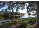 Serene lakefront property with fountain at 6669 Windjammer Pl, Lakewood Ranch, FL 34202