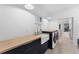 Modern laundry room with farmhouse sink and ample counter space at 6669 Windjammer Pl, Lakewood Ranch, FL 34202