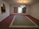 Bright dining room with a chandelier and neutral carpeting at 7020 Sena Rd, North Port, FL 34291