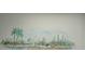 Scenic wall art depicting a tranquil landscape with palm trees and a bridge at 7020 Sena Rd, North Port, FL 34291