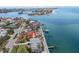 Aerial view showcasing waterfront property with private dock at 709 Key Royale Dr, Holmes Beach, FL 34217