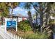 Pine Avenue Bait and Tackle shop with white picket fence at 709 Key Royale Dr, Holmes Beach, FL 34217