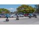 People riding segways in a parking lot near the beach at 709 Key Royale Dr, Holmes Beach, FL 34217