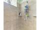 Clean and updated shower with tiled walls at 7215 Treymore Ct, Sarasota, FL 34243