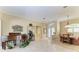 Open and bright living room with access to the formal dining area at 7215 Treymore Ct, Sarasota, FL 34243