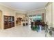 Open living area with a view into the kitchen and access to the backyard at 7215 Treymore Ct, Sarasota, FL 34243