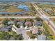 Aerial view of a residential neighborhood with houses at 7302 Deer Crossing Ct, Sarasota, FL 34240