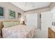 Spacious bedroom with large closet and ensuite bath access at 7302 Deer Crossing Ct, Sarasota, FL 34240